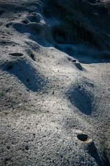 Moon like rock surface forming natural craters in Cane Malu Sardinia Italy