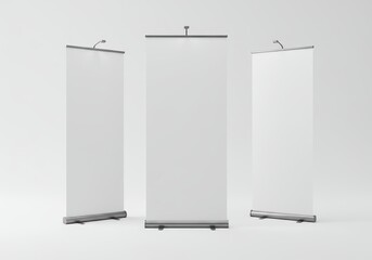 Three blank pull up banners stand in a row on a white background.
