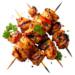 Close-up of grilled, glazed chicken skewers with vegetables and herbs on a black background