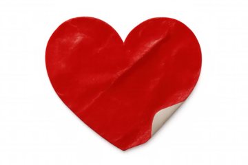 Peeling red heart adhesive sticker with crumpled texture on transparent background representing love and romance