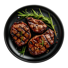 Three grilled steak cuts arranged on a black plate with fresh rosemary sprigs, overhead view