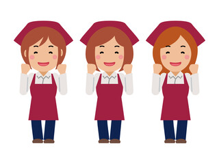 がんばりますと笑顔。真紅のエプロンと三角巾の女性