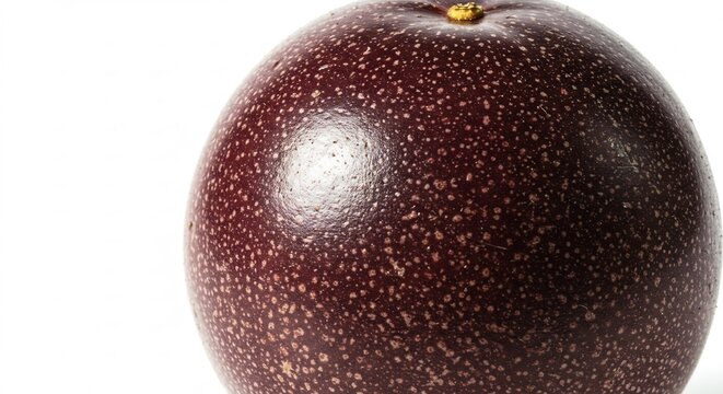 Frische exotische Passionsfrucht mit dunkler violetter Schale gl�nzt sanft im hellen Studiolicht auf weissem Grund. AI Generated