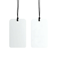 Two white, rectangular, blank tags hanging from black strings against a stark black background