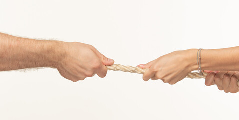Hands pulling a rope close-up