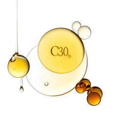 Golden spheres and droplets, some translucent, overlay a stark black backdrop, with "C30" visible