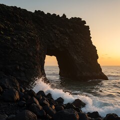 Dramatic Sea Arch at Sunset with Crashing Waves.