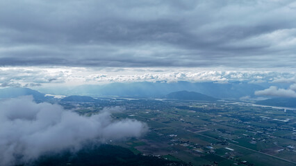 Drone view of the valley under the clouds.