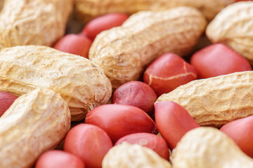 Closeup view of fresh peanuts on wooden table