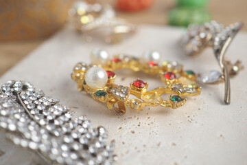 Vintage brooches and earrings on display