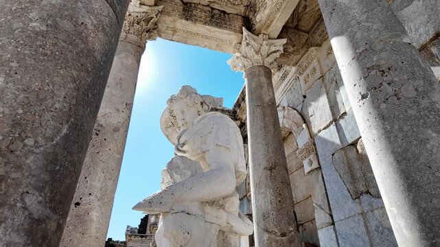 Burdur, Turkey: Footage of a statue at the Antonine Nymphaeum, a historic fountain located in the upper agora of the ancient city of Sagalassos in Turkey on sunny day