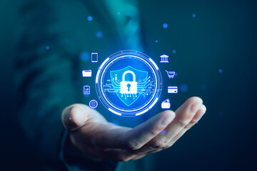 Businessman holding digital padlock icon with security shield, representing cybersecurity, data protection, online privacy, digital safety, secure network, and information technology concept.