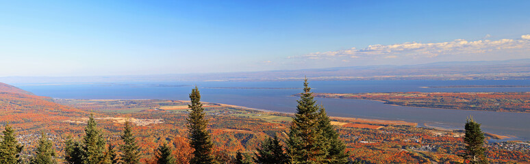 Aerial view over the St Lawrence River from Mont Sainte Anne in autumn, Quebec, Canada