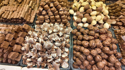 Variety of chocolate confections displayed at a market