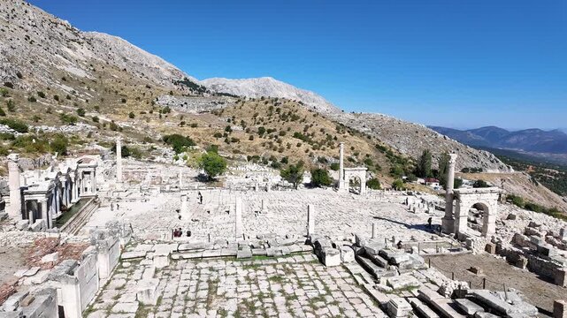 Burdur, Turkey: Panoramic footage of upper agora with Arch of Claudius in Sagalassos ancient city. Famous archeological site in Burdur, Isparta Province, Turkey. Taken from above on sunny day