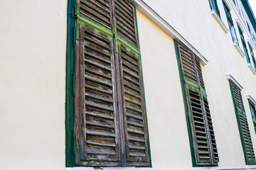 Exterior old wooden window blinds