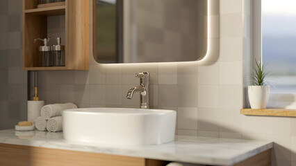 Fototapeta premium Mirror and wooden shelf on tiles wall over ceramic sink on marble counter with towels in bathroom.