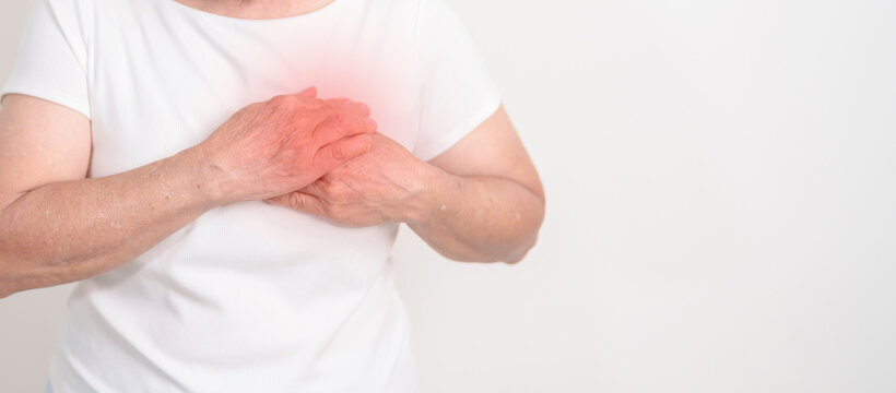 Elderly Woman having chest pain for Heart disease, angina disease and symptom heart attack disease Cardiovascular, Atherosclerosis, Hypertensive, Breast Cancer awareness, world Heart day and Health - Powered by Adobe