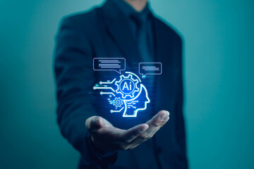 Businessman holding artificial intelligence icon representing AI technology, innovation, digital transformation, and smart solutions for future business, automation, and data-driven management.