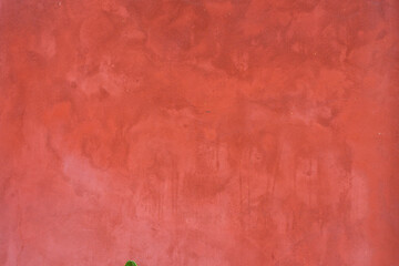 Red concrete surface with the rough and scratched surface, very old orange cement wall,