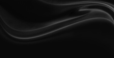 Black fabric exhibits the luxurious sheen and soft folds of satin or silk, with gentle highlights and shadows creating a sense of depth and movement