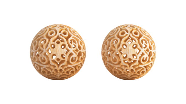 Two ornate carved eggs isolated on transparent background