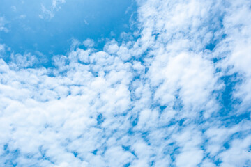 Fototapeta premium Panorama of cloud clear sky background for summer vacation concept at ocean and summer sea water with sunlight of beautiful cloudy 