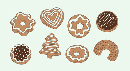 Collection of gingerbread cookies in various shapes decorated with white and brown icing on a light green background.