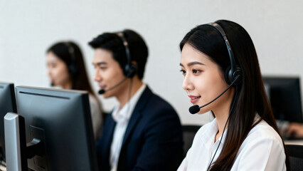 Call center workers with headsets