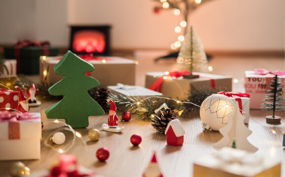 Christmas home decorations with balls, gift boxes, dolls.
