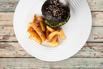 Tasty fresh hot fast food Burger on desk