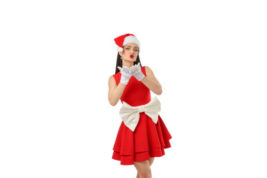 Woman in red dress and Santa hat blowing kisses, isolated, PNG