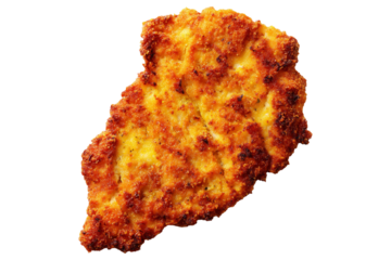 Milanesa breaded beef chicken schnitzel or cutlet with parsley garnish, isolated on white transparent background, concept of South American Cuisine