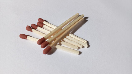 Matches on a white background. Wooden Match sticks