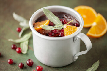 Cranberry Orange Sage Moscow mule, holiday drink in a copper mug.