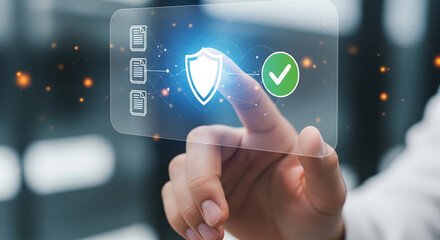 Futuristic Data Security. User finger presses a shield icon on a transparent display to verify and protect digital files.