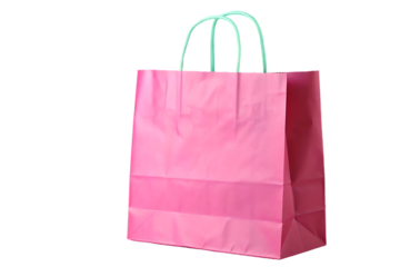A single bright pink paper shopping bag with white handles stands out against a solid black background