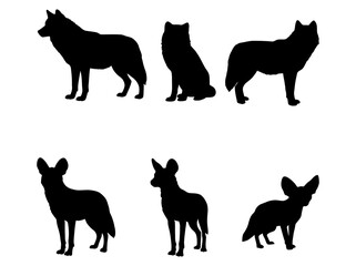 Set of six black silhouettes of dogs standing and sitting on a white background