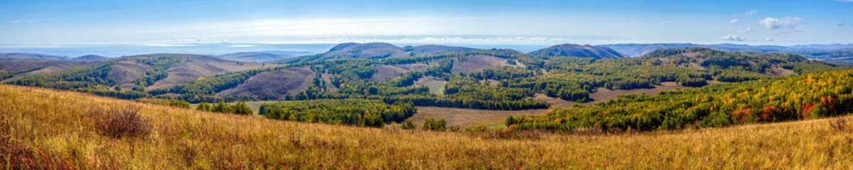 Magnificent landscape of the Karamuruntau ridge in the rays of the setting sun