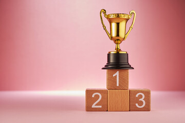 golden trophy on the podium