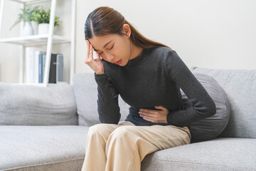 Flatulence ulcer, asian young woman, girl hands in belly, stomach pain from food poisoning,...