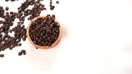 Coffee Beans in Wooden Bowl on White Background