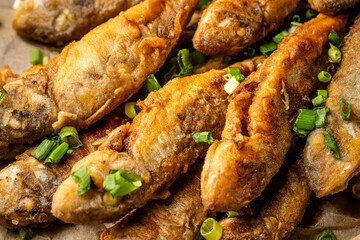 Crispy fried fish with green onions