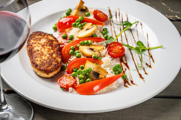 Grilled chicken cutlet with rice and vegetables