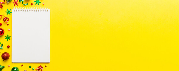 Christmas blank greeting card mock-up scene. Creative layout made of Christmas tree branches and paper card note. Flat lay. Nature New Year concept