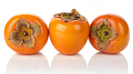 Three ripe orange persimmons are arranged in a row, isolated on white background, showcasing their vibrant color and unique shape