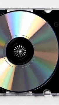 Close-up View of a Compact Disc in a Jewel Case Displaying Reflective Rainbow Patterns on Its Surface