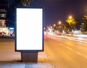 Empty Vertical space advertisement board, blank white signboard on roadside in city, Vertical blank billboard in city in night time, White signboard on roadside for advertisement placement
