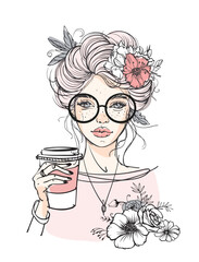 A young woman wearing glasses holds a takeaway coffee cup decorated with floral elements. Fashion illustration with a floral arrangement. Beauty and lifestyle concept. Hand-drawn vector illustration.