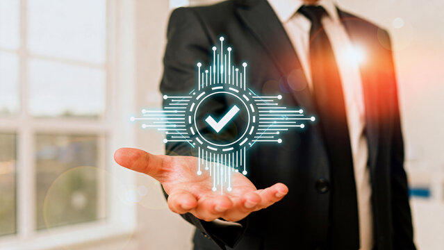 Businessman holding digital security icon